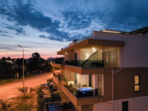a building with a view of a street at Luma Luxury Apartment with Jacuzzi in Zadar