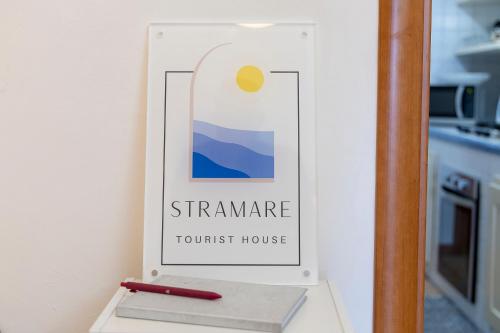 Un certificado, premio, letrero u otro documento en Stramare