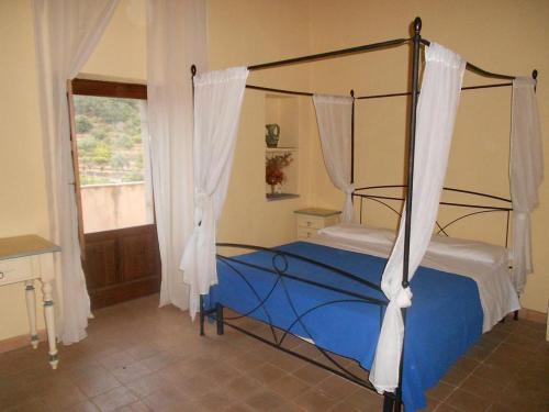 מיטה או מיטות בחדר ב-La Locanda degli Amici
