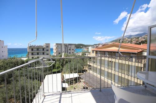 a balcony with a view of the ocean at Stef & Stam Nerantzis in Himare