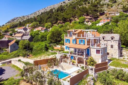 Two houses Villa Diana Jesenice with pool, sauna, playground