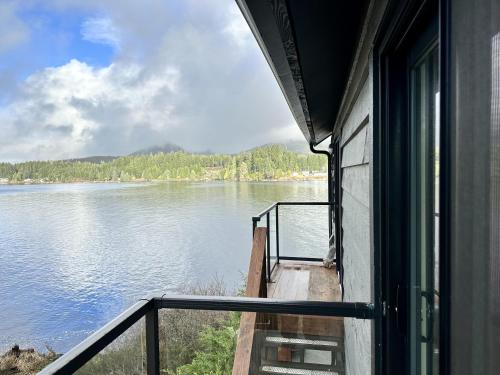 a view of a river from a window of a boat at Private Room On Waterfront Property With Hot Tub & Firepit - Sea Esta in Ucluelet