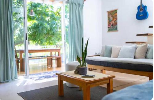 Una cama o camas en una habitación de Kai Villa