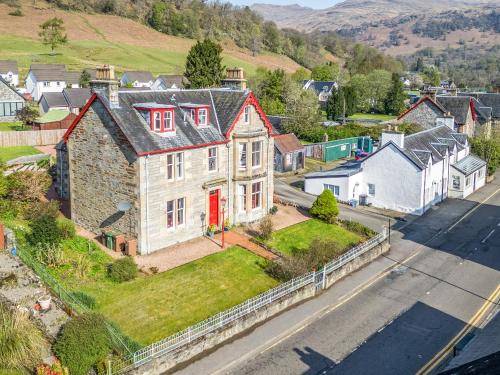 an aerial view of a house with a red door at Tayview in Killin
