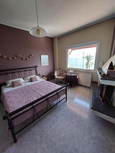 Postel nebo postele na pokoji v ubytování Platanidia Apartment Pelion