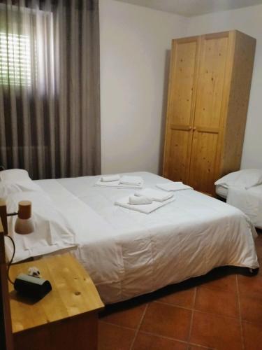 Postel nebo postele na pokoji v ubytování A' Porta i Frustere