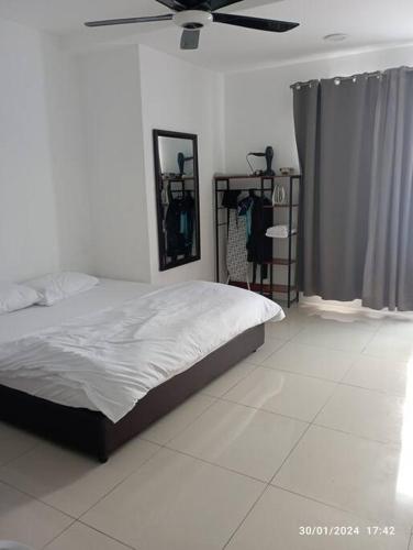Katil atau katil-katil dalam bilik di 3R Guest House Manhattan Condominium