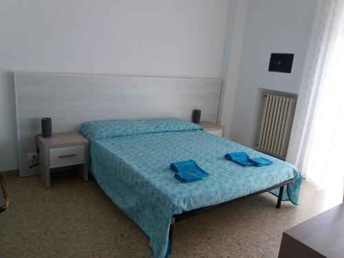 Ένα ή περισσότερα κρεβάτια σε δωμάτιο στο Sophia Appartament