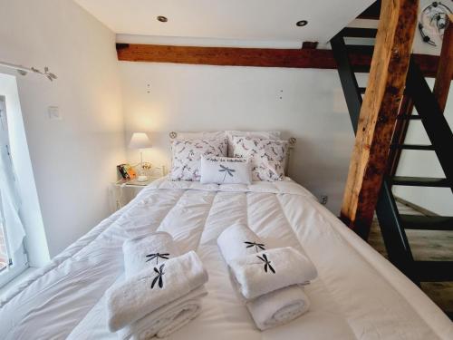 Postel nebo postele na pokoji v ubytování Charmante maison avec jardin, spa à proximité, idéale pour famille et couple, animaux acceptés - FR-1-510-214