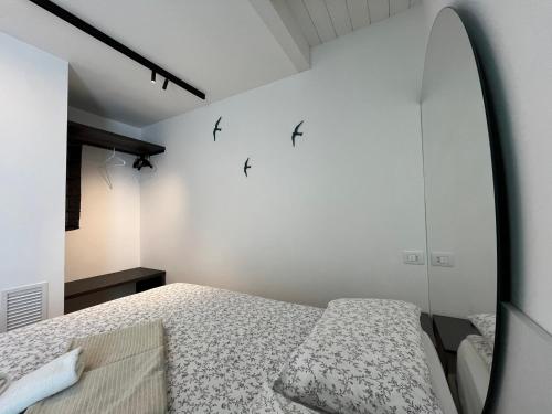 Llit o llits en una habitació de SKY GARDEN locazione turistica
