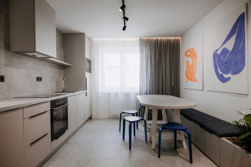 A kitchen or kitchenette at SlovakUnity Apartment
