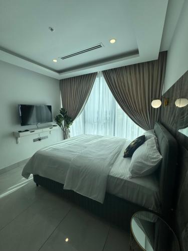 Ein Bett oder Betten in einem Zimmer der Unterkunft Executive Studio Apartment at Kass Towers Accra - Top floor, City View