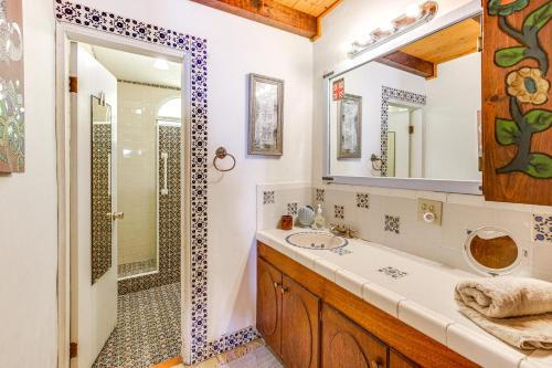 a bathroom with a sink and a shower at Rosarito Beach Home in Las Gaviotas with Ocean Views in Raulis