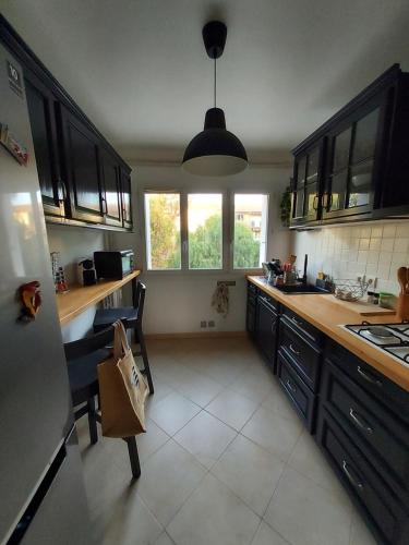 Entre Soleil & Palmiers - Appartement équipé, terrasse et parking