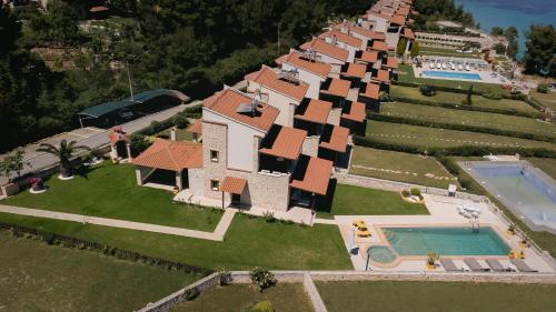 an aerial view of a house with a swimming pool at Zeus Sea View Villa with Private Pool, Afytos in Afitos