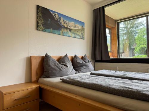 Postel nebo postele na pokoji v ubytování Ferienwohnung an der Traun