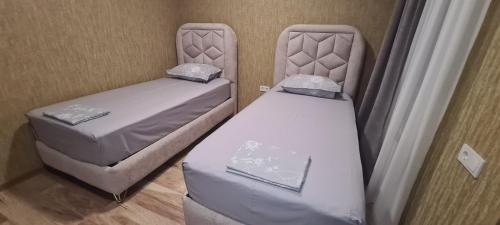 Una cama o camas en una habitación de KHORGO