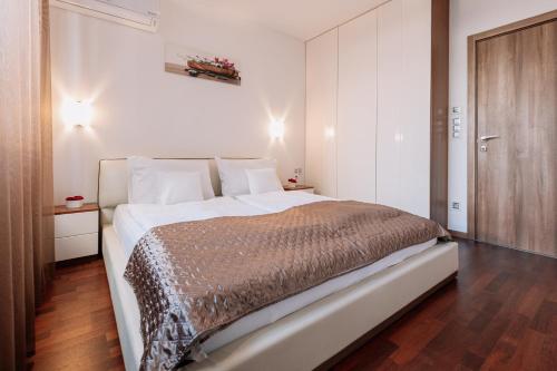 Säng eller sängar i ett rum på REVON Business apartment 50 Dunajská
