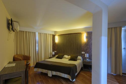 Postel nebo postele na pokoji v ubytování Hotel Costamar