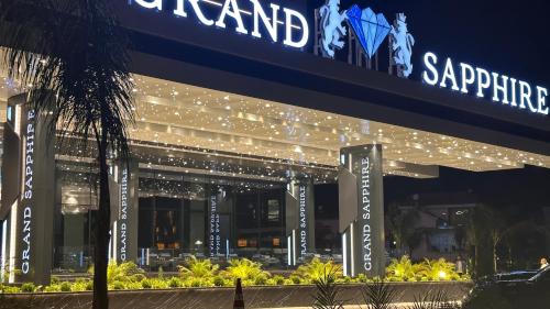 a building with lights on the side of it at 2 Bedroom Amazing sea view Grand Sapphire in Iskele