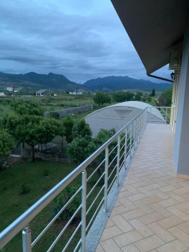 a balcony with a view of the mountains at Hotel Villa Linda in Shkodër