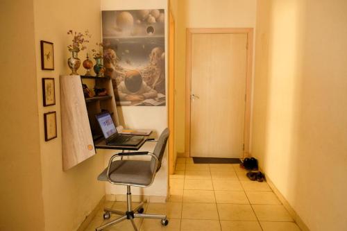 a room with a desk with a laptop on it at Room in Agadir Morocco in Agadir
