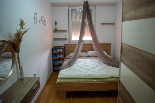 Una cama o camas en una habitación de B&M Apartment