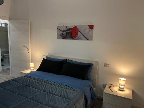 Postel nebo postele na pokoji v ubytování Appartamento Pilastro Viterbo