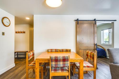 a dining room with a wooden table and chairs at Hot Tub Access Bright Breckenridge Condo in Breckenridge