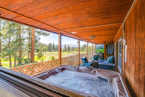 a hot tub on the balcony of a house at Hot Tub and Mtn Views Epic Stateline Escape! in Stateline