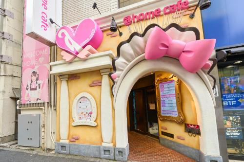 a store with pink bows on the side of a building at Hotel Resol Akihabara in Tokyo