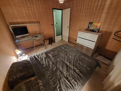 Säng eller sängar i ett rum på T2 - 51m² avec parking