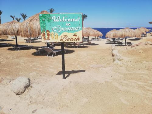 a welcome to the beach sign in the sand at Chalet NEMO, vista mare, Sharks Bay, Sharm el Sheikh in Sharm El Sheikh
