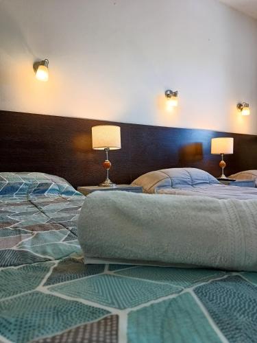 Katil atau katil-katil dalam bilik di Hotel Estrella Andina