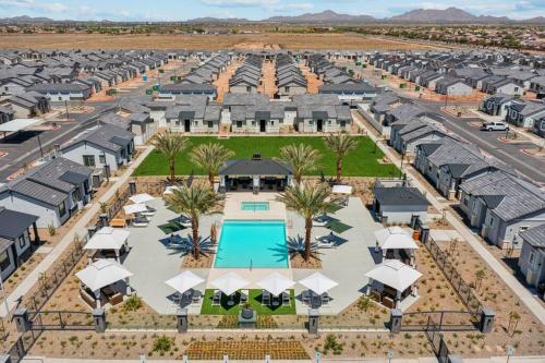an aerial view of a resort complex with a pool at Breezy Modern House in Casa Grande with Pool,BBQ in Casa Grande