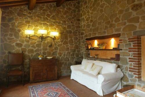 Ένα ή περισσότερα κρεβάτια σε δωμάτιο στο Agriturismo Borgo La Casetta