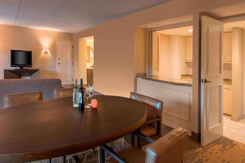 a dining room with a table and chairs at The Westin Lake Las Vegas Resort & Spa in Las Vegas