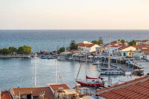 a group of boats are docked in a harbor at Endless Blue in Pythagoreio