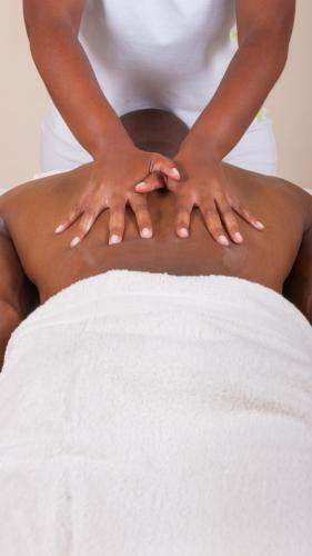 a woman with her hands on her stomach at TANTRAFRIQUE in Montréal