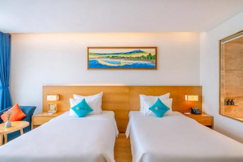 Katil atau katil-katil dalam bilik di Sala Danang Beach Hotel