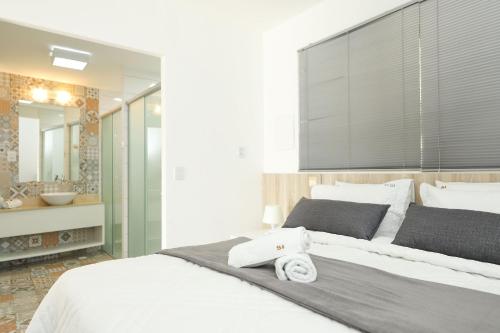 Postel nebo postele na pokoji v ubytování Solar Água Pipa - Summerflats