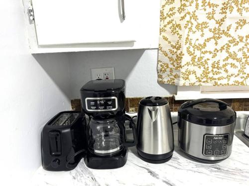 a group of appliances sitting on a kitchen counter at Getaway at Falls-3 Beds-Slips 6 in Niagara Falls