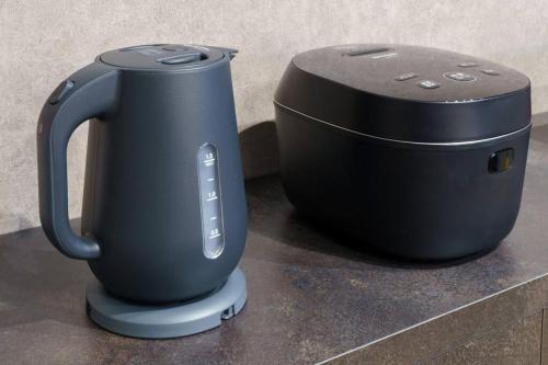 a black coffee maker sitting on a counter at 空翠 - Kusui 1日1組限定の貸切宿 in Karatsu