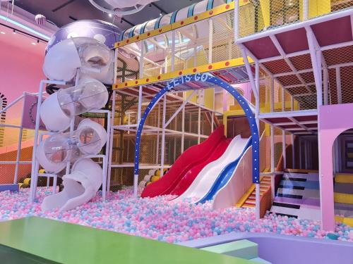 a play room with a slide and a water park at Flamingo Hải Tiến - Căn góc 2 Phòng - View 2 mặt biển in Thanh Hóa
