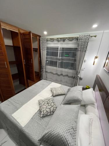 Postel nebo postele na pokoji v ubytování Residence Therese La Grâce