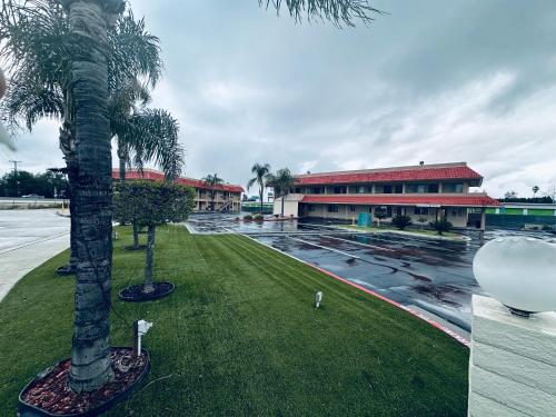 an empty parking lot in front of a building at Americas Best Value Inn Calimesa in Calimesa
