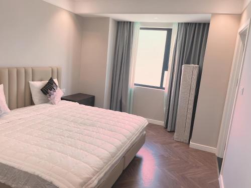 Ένα ή περισσότερα κρεβάτια σε δωμάτιο στο Luxury Apartment Altara