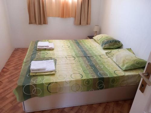 Łóżko lub łóżka w pokoju w obiekcie Vila Gerbera