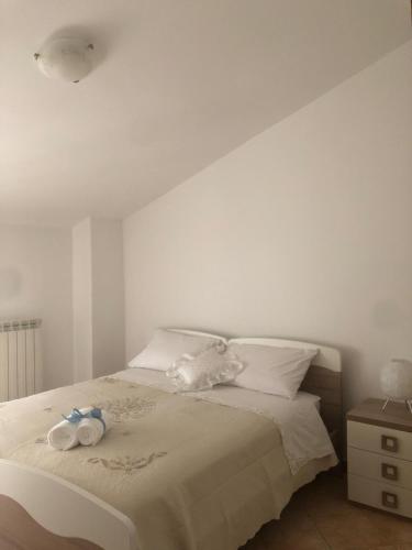 Ένα ή περισσότερα κρεβάτια σε δωμάτιο στο Casa Colli Orsogna