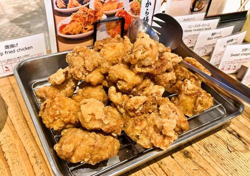 a tray of fried food on a table at APA Hotel Ueno Ekimae in Tokyo